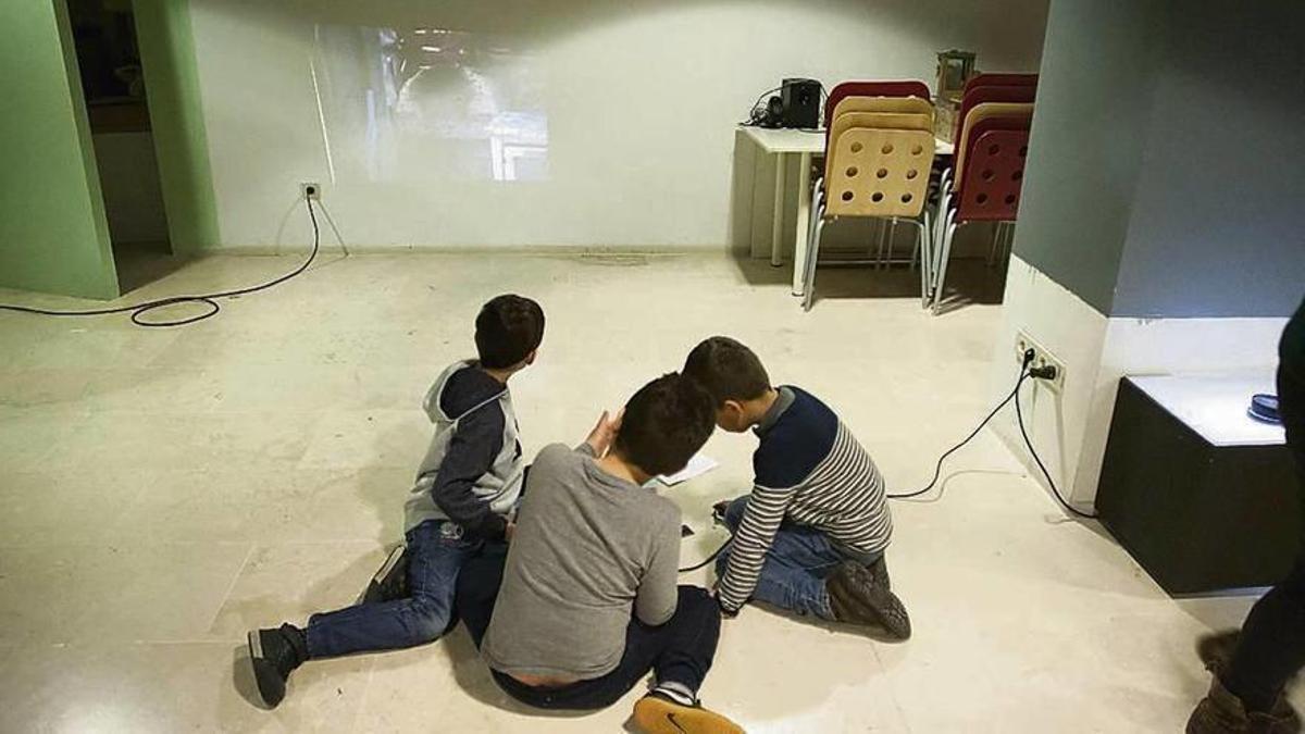Unos niños participan en un taller en el Museo Etnográfico de Castilla y León