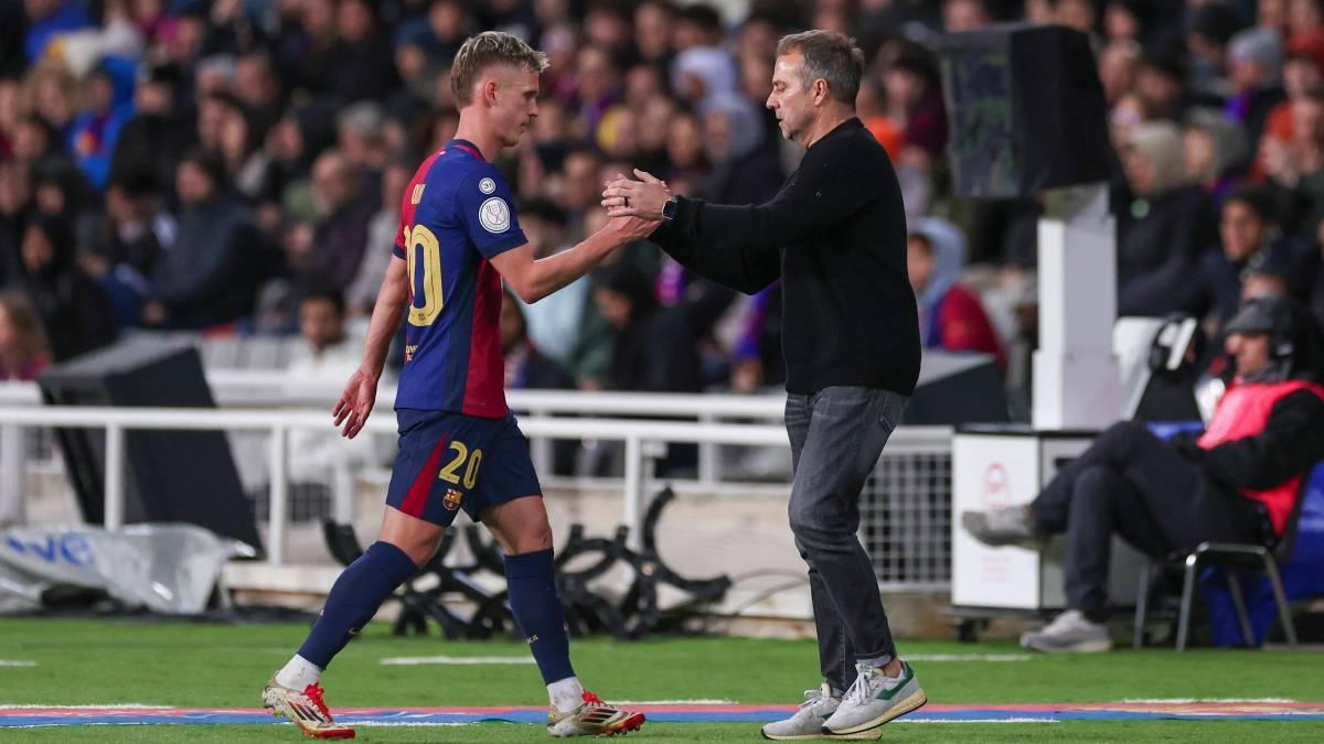 Flick saluda a Olmo durante el Barça-Atlético de Copa