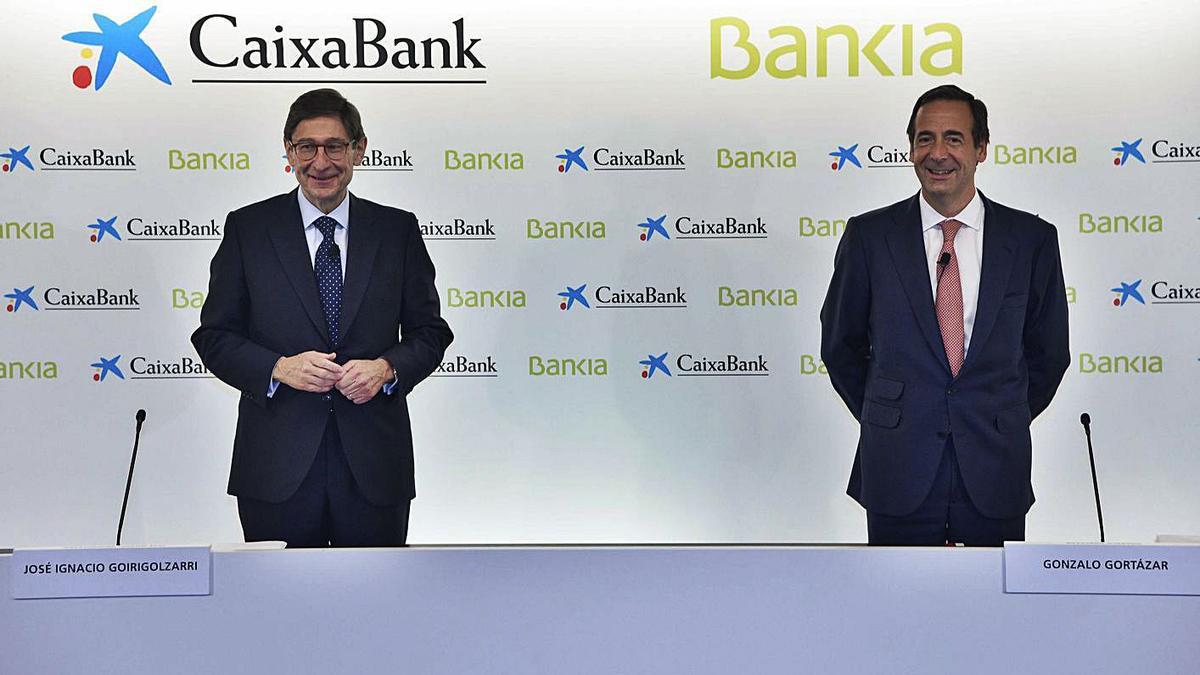 Presentación del acuerdo de fusión entre CaixaBank y Bankia. | DAVID CAMPOS