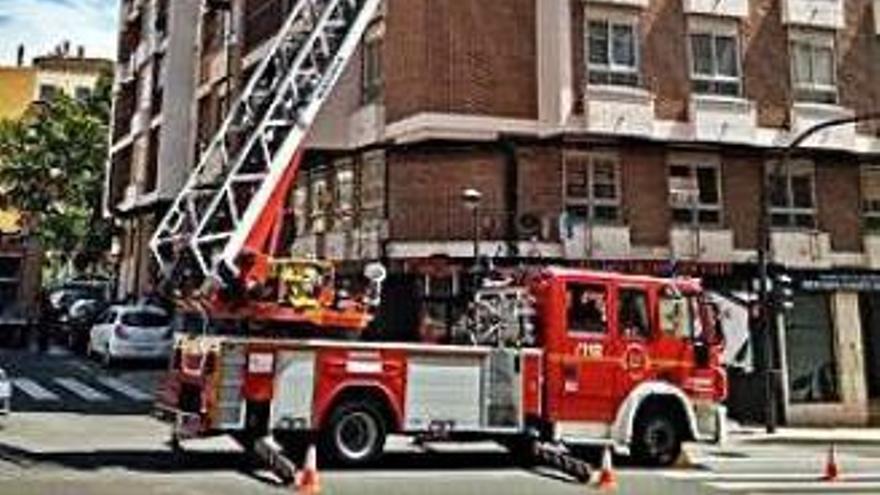 Bomberos, en un servicio.