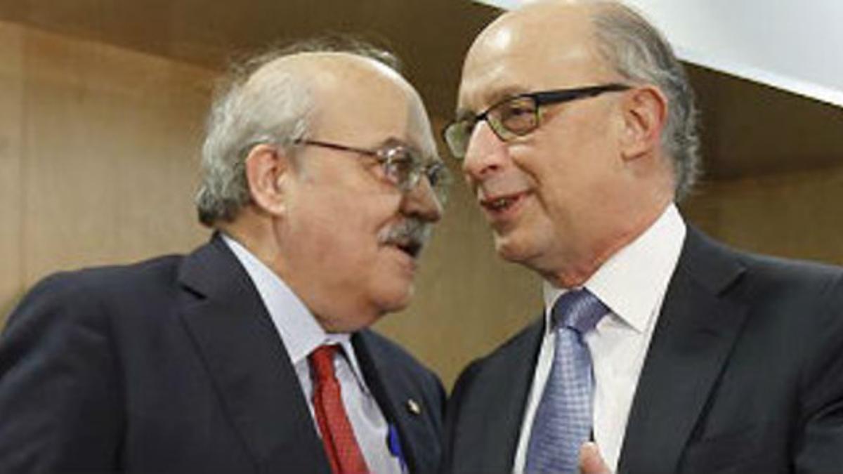 El 'conseller' de Economia, Andreu Mas-Colell, y el ministro de Hacienda, Cristóbal Montoro, en la reunión del Consejo de Política Fiscal y Financiera