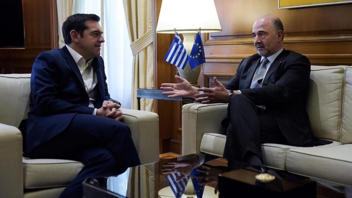Tsipras y Moscovici.