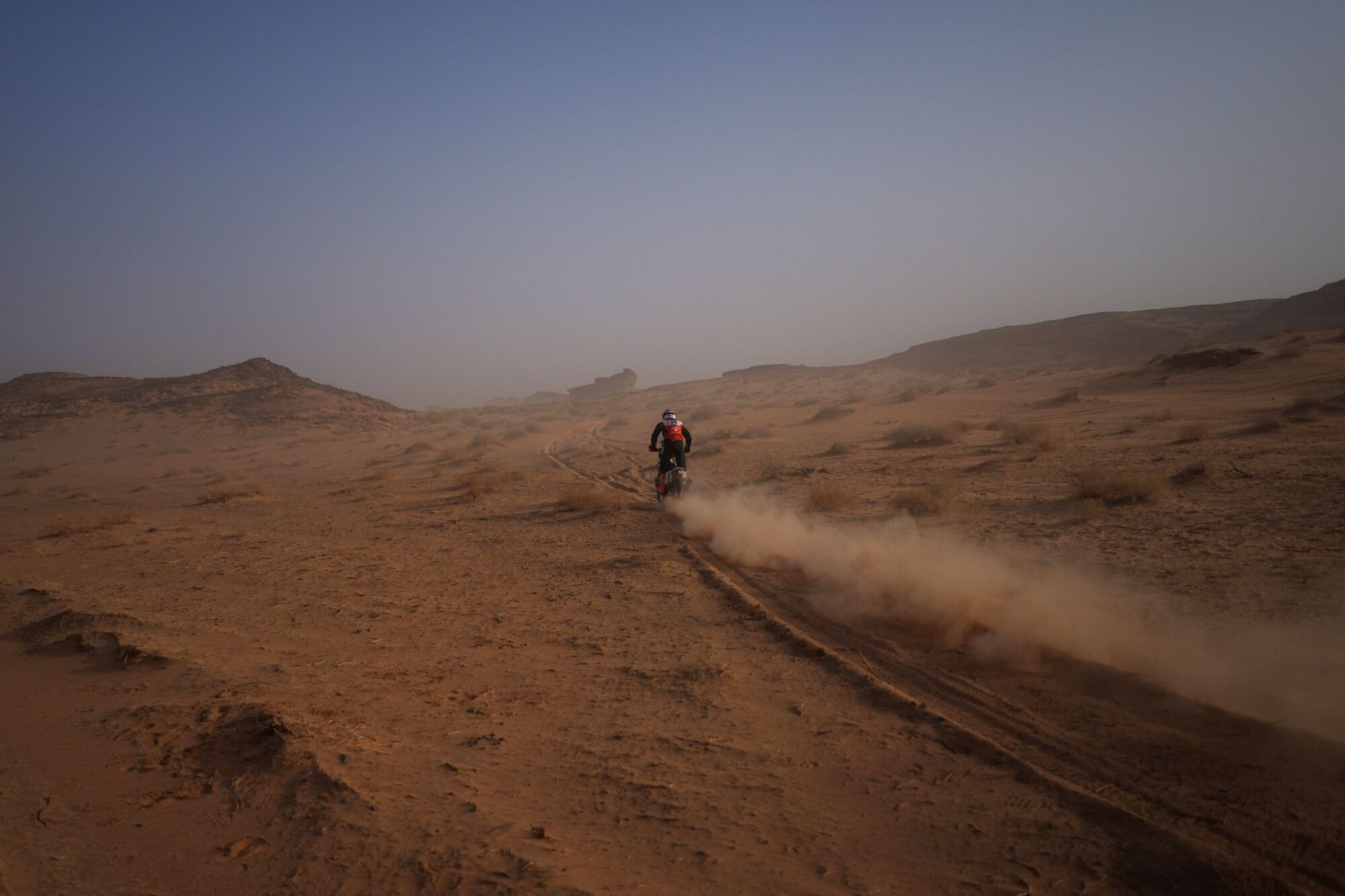 Rider Jerome Bas competes during the third stage of the Dakar Rally with a start and finish in Alula, Saudi Arabia, Tuesday, Jan. 6, 2026. (AP Photo/Thibault Camus)
