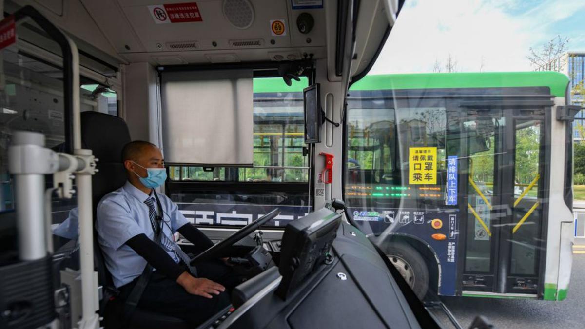 Un conductor d’autobús de Pequín en servei | EUROPA PRESS