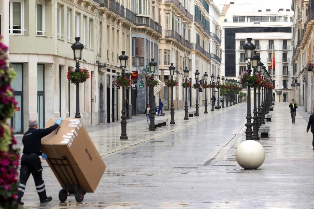 Calles vacías e inhóspitas en lo que era un Centro de Málaga bullicioso y lleno de actividad.