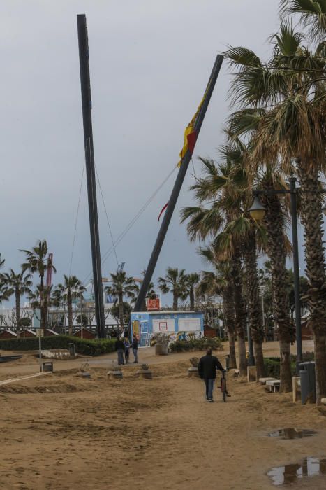 Temporal de lluvia: las mejores imágenes del paseo marítimo de València cubierto de arena