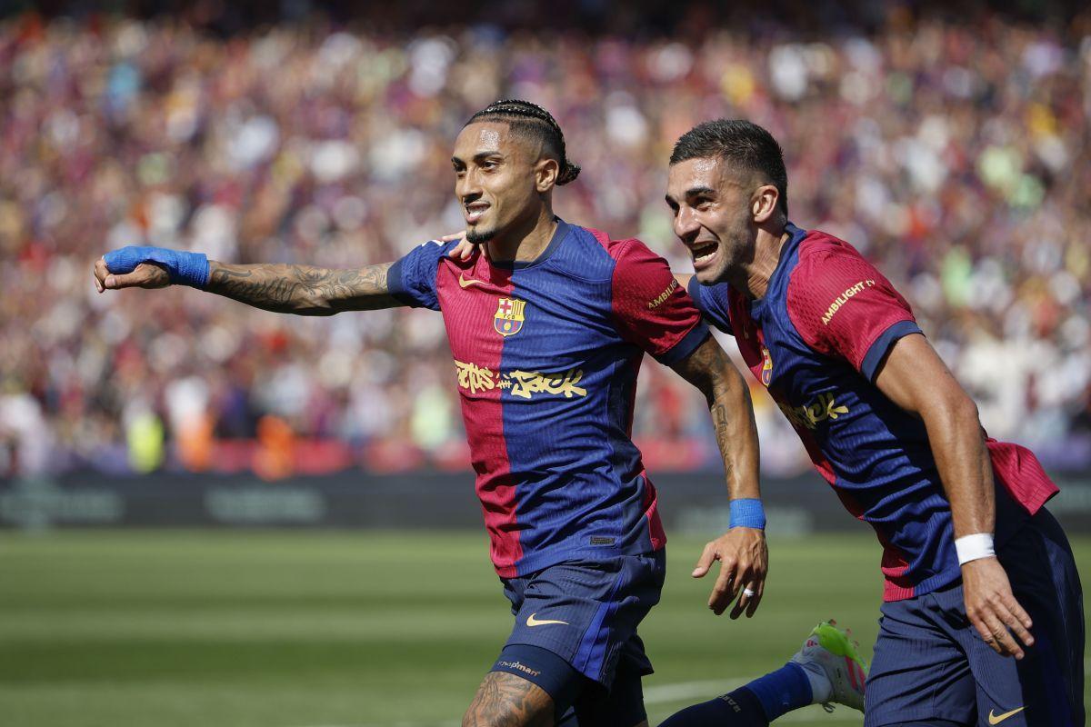 Raphinha and Ferran Torres celebrate the second goal against Real Madrid