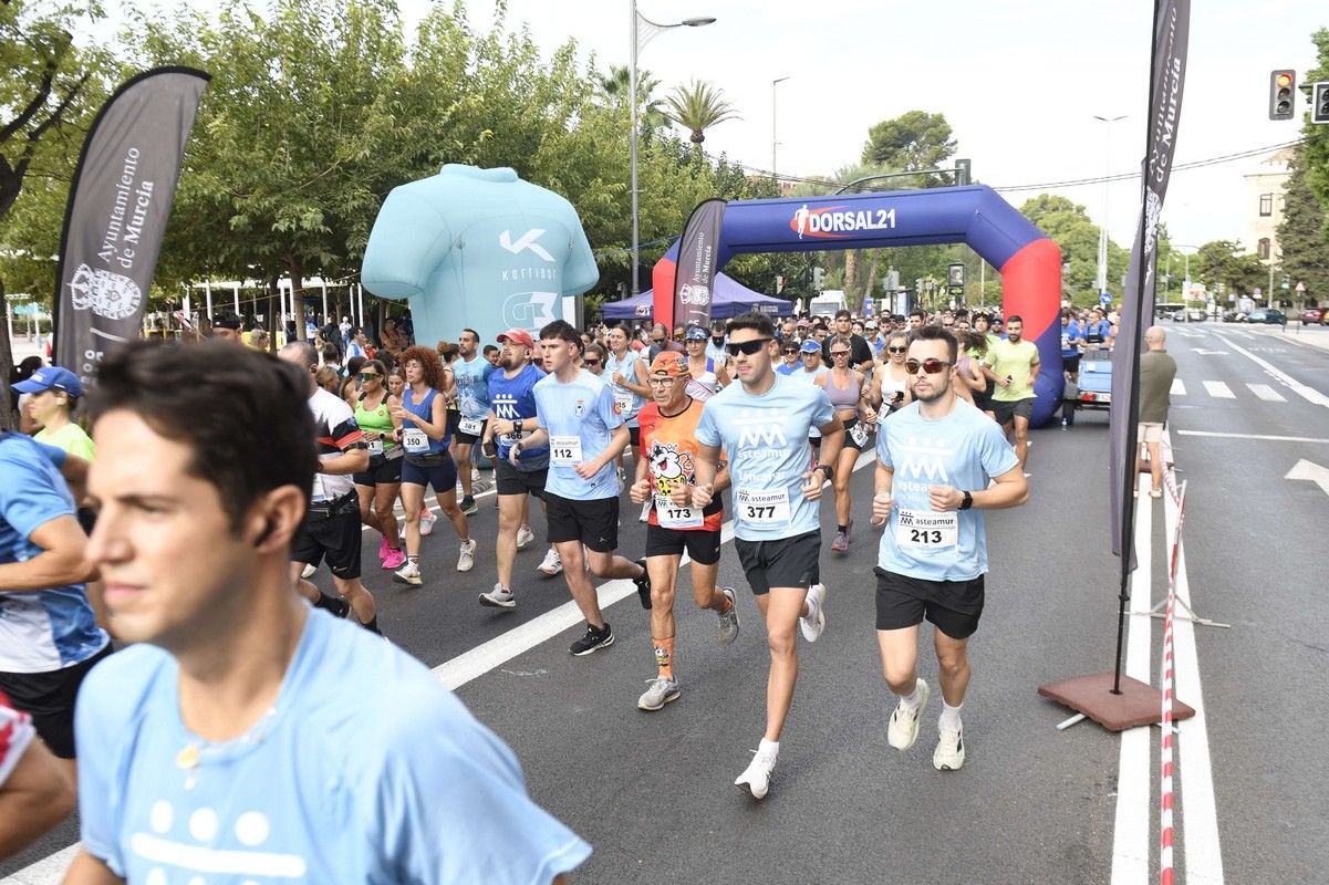 La carrera y marcha Solidaria Asteamur, en imágenes