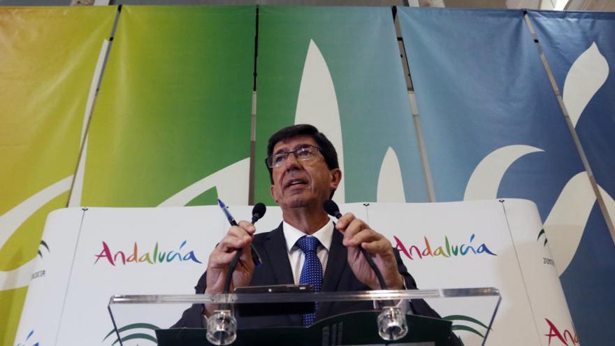 Juan Marín, durante su comparecencia ante los medios en la presentación de la nueva campaña promocional de Andalucía.