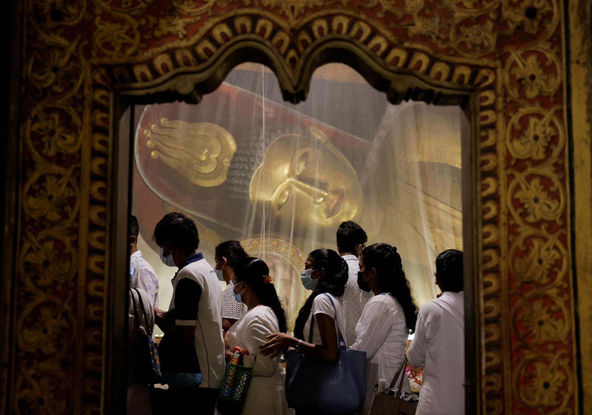 Sri Lankan Buddhists commemorate the birth, enlightenment and death of Buddha on Vesak day, in Colombo