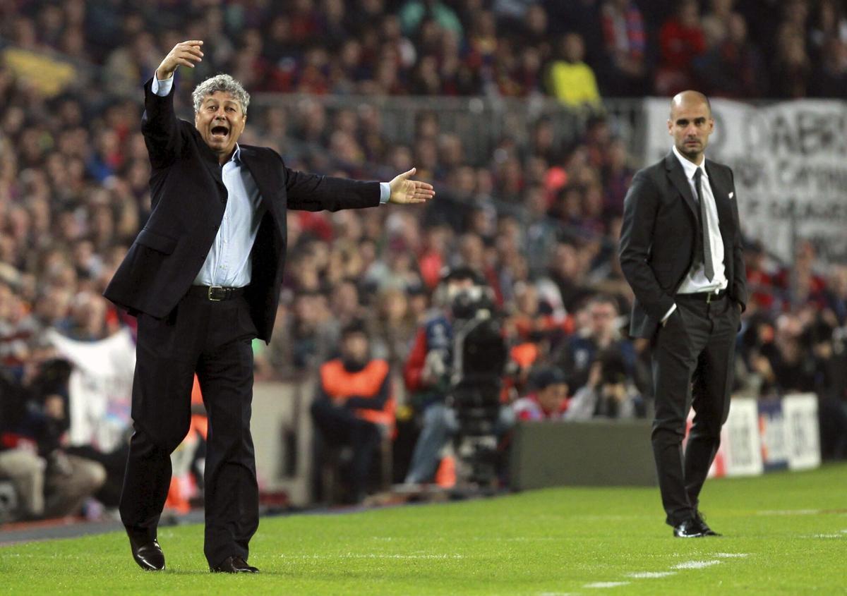 Lucescu, con Guardiola al fondo, en un partido entre el Shakhtar y el Barça en 2011.
