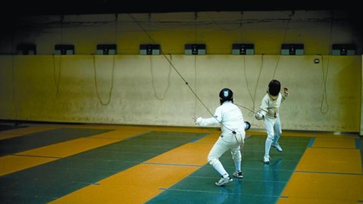 Dos tiradores entrenan en elComplex Esportiu Municipal Reina Elisenda, en Barcelona.