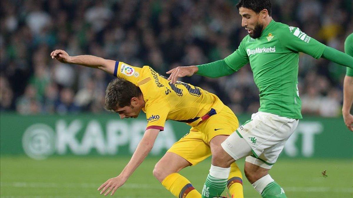 Sergi Roberto y Fekir, en una acción del partido