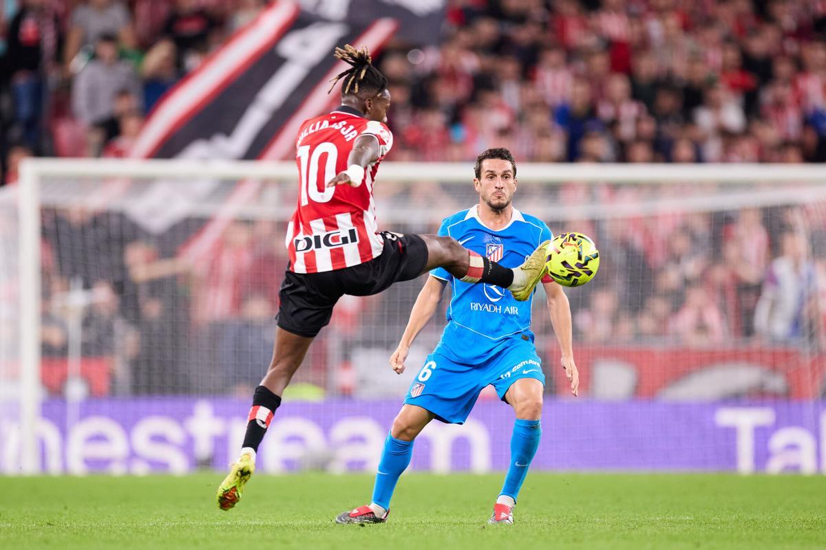 Nico Williams of Athletic Club competes for the ball with Koke Resurreccion of Atletico de Madrid during the LaLiga EA Sports match between Athletic Club and Atletico de Madrid at San Mames on December 6, 2025, in Bilbao, Spain. AFP7 06/12/2025 ONLY FOR USE IN SPAIN. Ricardo Larreina / AFP7 / Europa Press;2025;SPAIN;SPORT;ZSPORT;SOCCER;ZSOCCER;Athletic Club v Atletico de Madrid - LaLiga EA Sports;