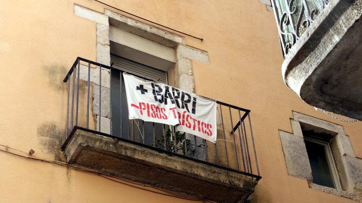 Protesta dels veïns del Barri Vell de Girona en matèria de pisos turístics.