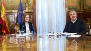 María Jesús Montero y Fernando Clavijo, durante la reunión para agilizar el reparto de 4.400 menores migrantes.