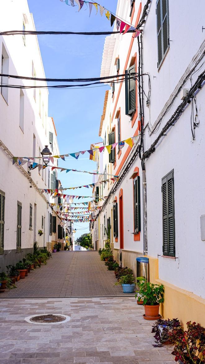 View of the village &quot;Es Migjorn Gran&quot;, Menorca, Balearic Islands, Spain, with festoons and plants