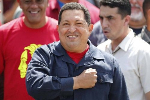 Venezuela's President Hugo Chavez arrives to cast his vote for the presidential election in Caracas