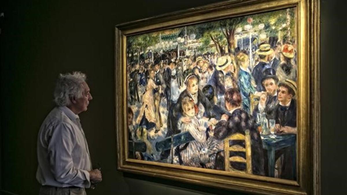 Un visitante observa el 'Bal du Moulin de la Galette', en la Fundación Mapfre.