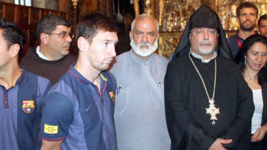 Xavi y Messi en la Basílica de la Natividad.