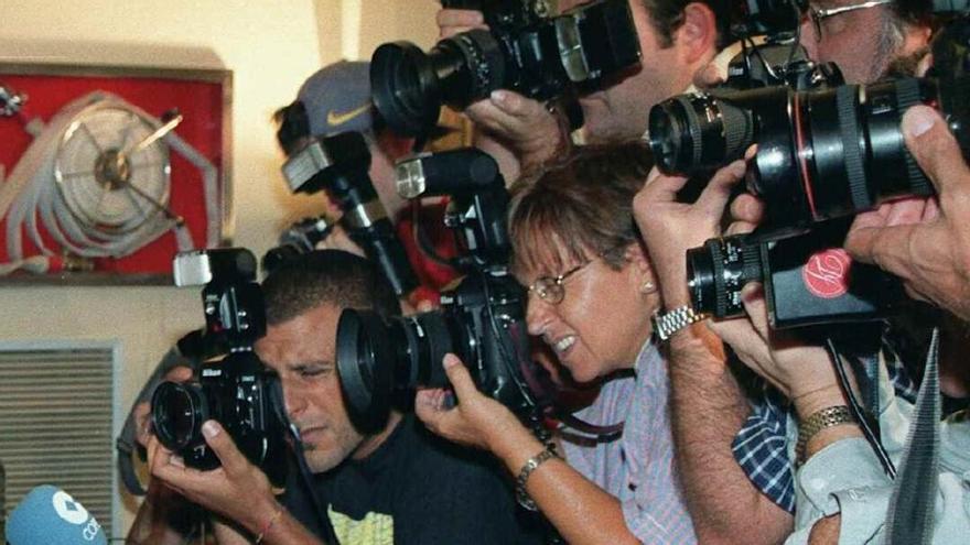 Imagen de fotógrafos en una rueda de prensa.