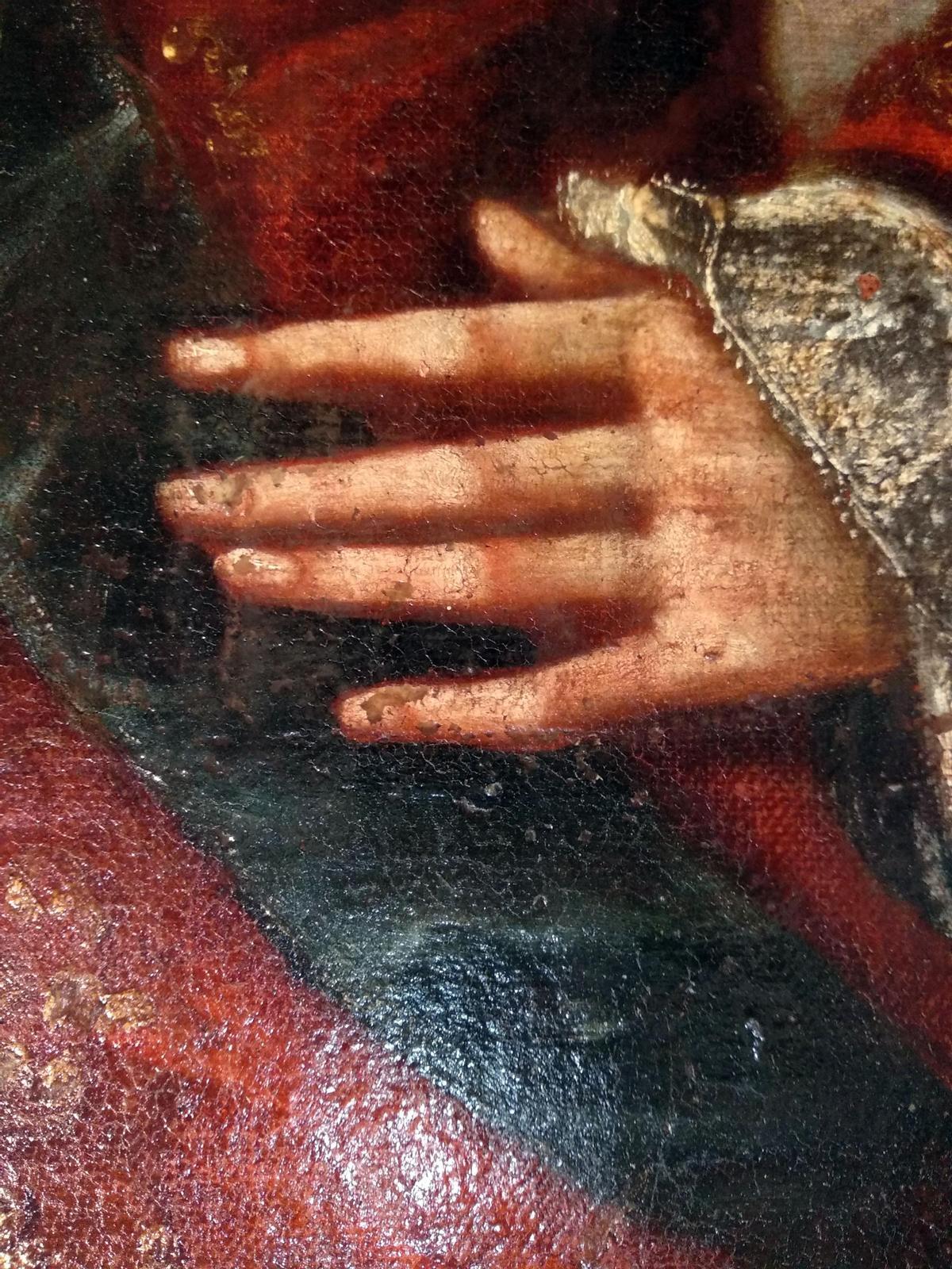Detalle de la mano del retrato.