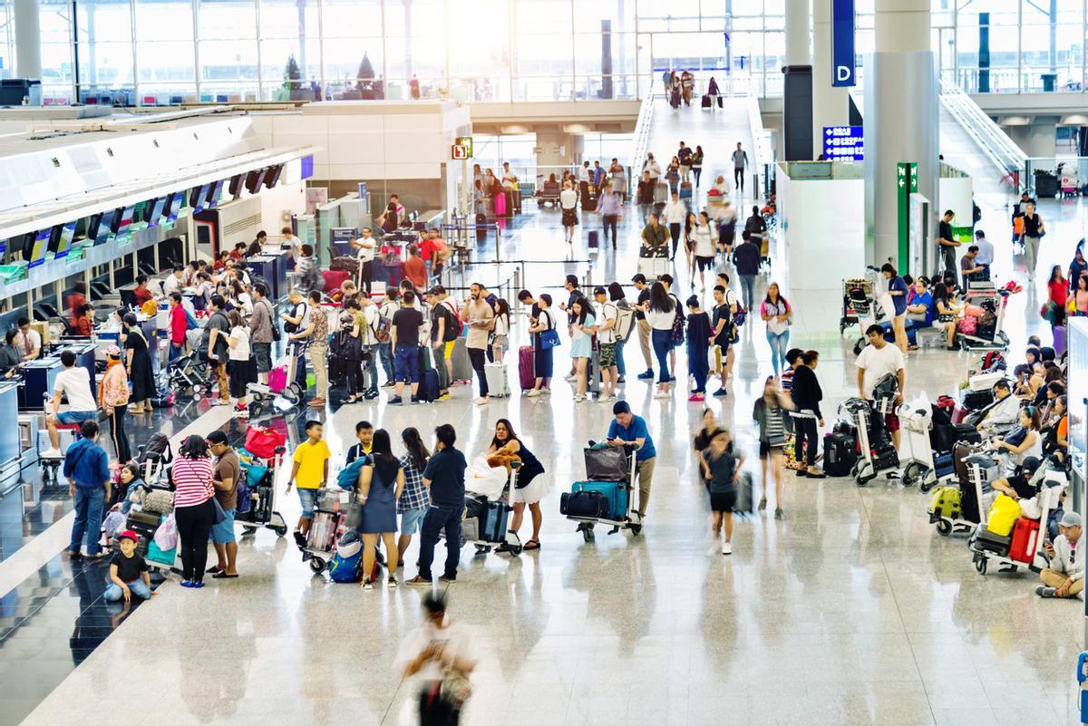 Filas para facturar en el aeropuerto.