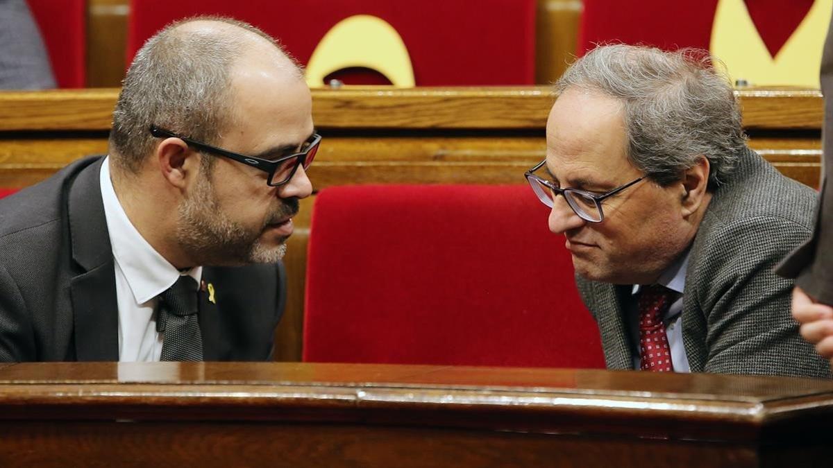 El 'conseller' Buch y el 'president' Torra, en el Parlament, el 24 de enero del 2019