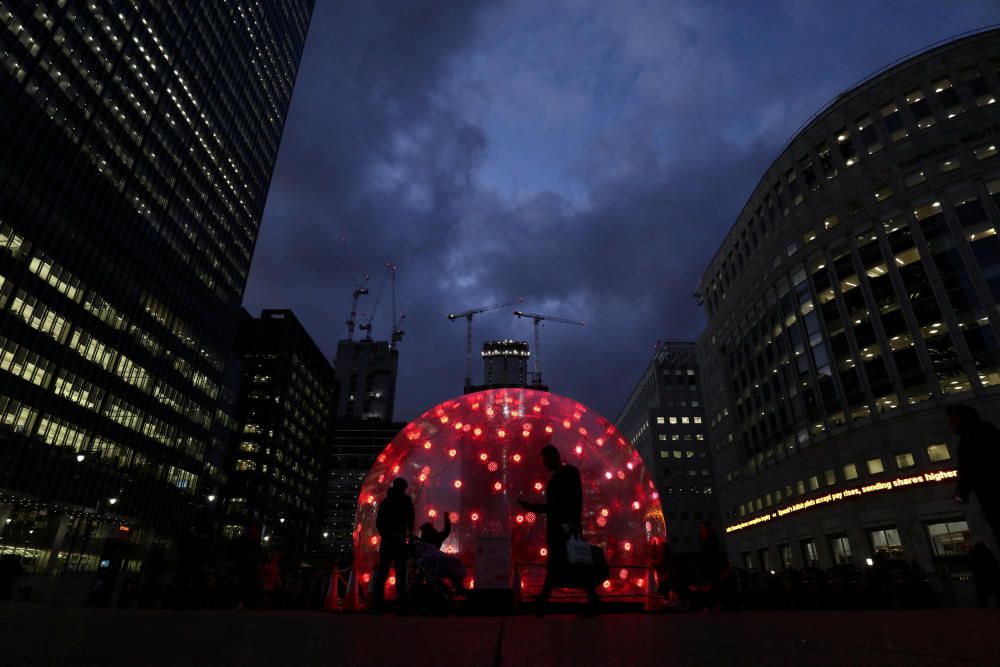 People look at an art installation called Sonic ...