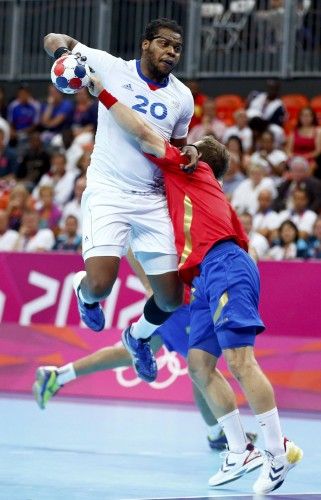 France's Cedric Sorhaindo takes a shot in his men's handball quarterfinals match against Spain at the Basketball Arena during the London 2012 Olympic Games