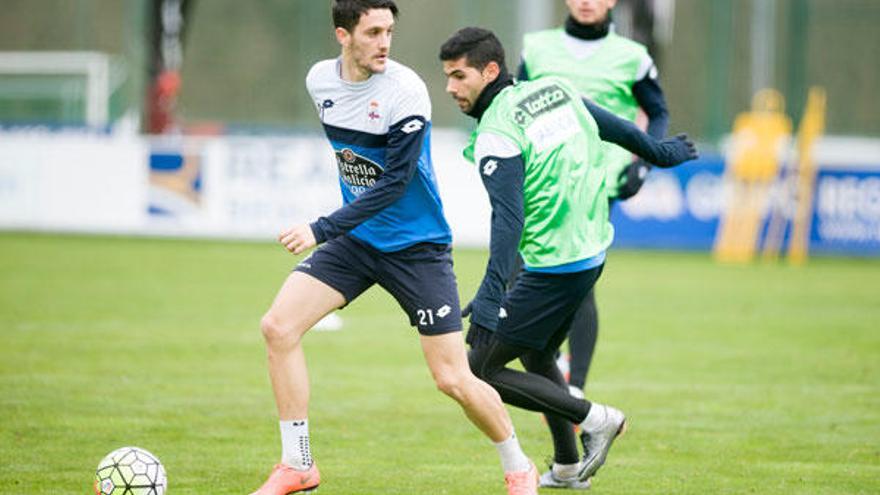 Juanfran, junto a Luis Alberto, en un entrenamiento.