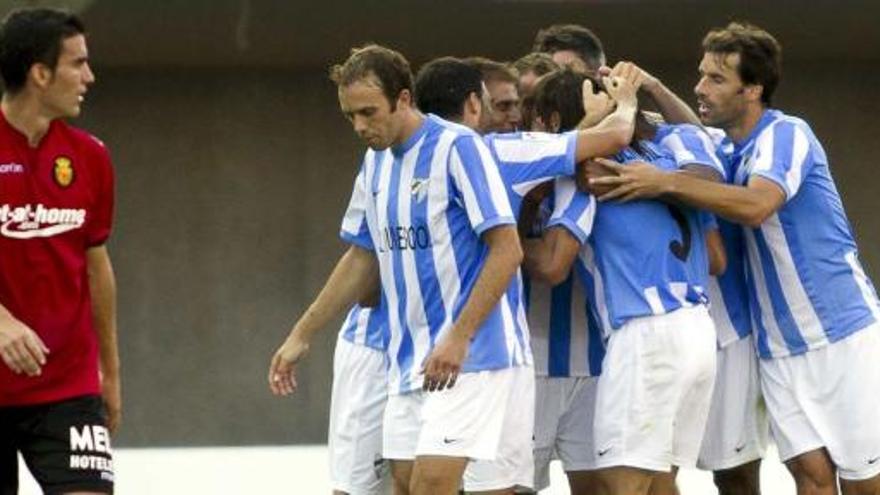 Los jugadores celebran el gol frente al Mallorca, último que marcó el Málaga fuera de casa.