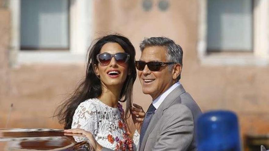 George Clooney y su mujer, Amal.