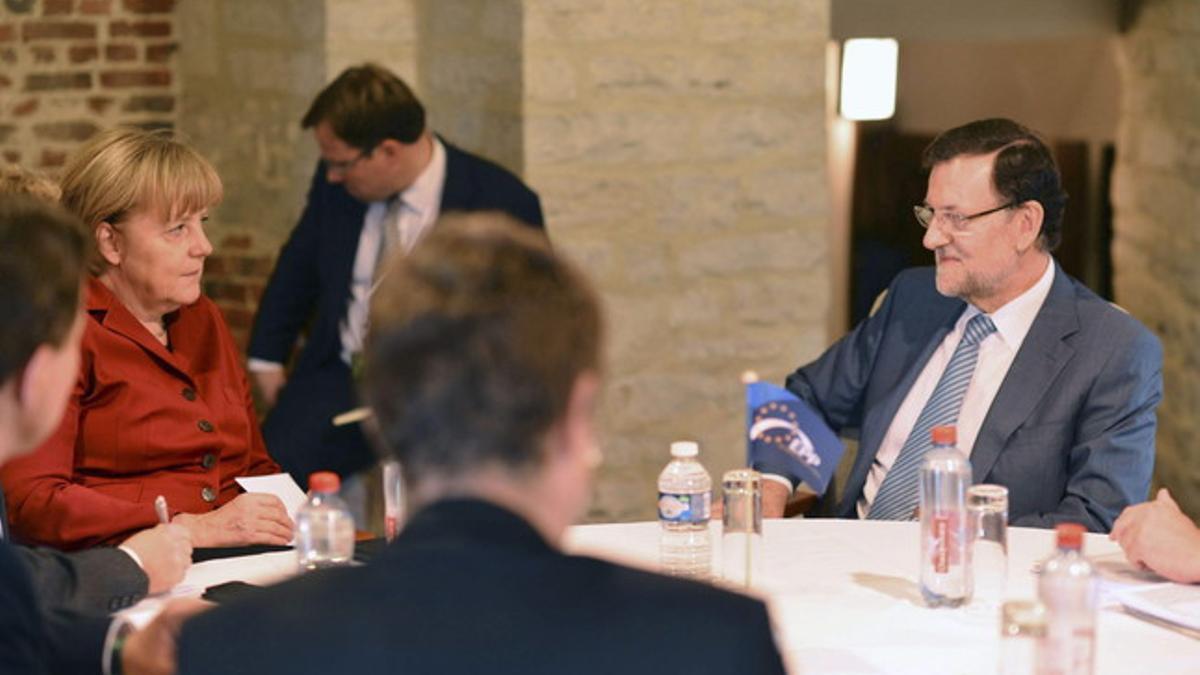 Mariano Rajoy, durante una reunión con Angela Merkel, el jueves en Bruselas.