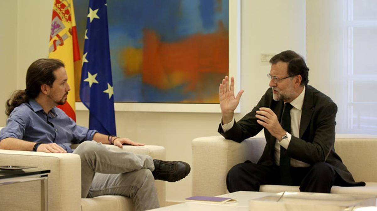 Mariano Rajoy, president del Govern, durant la reunió que ha mantingut amb Albert Rivera i Pablo esglésies, al Palau de la Moncloa.