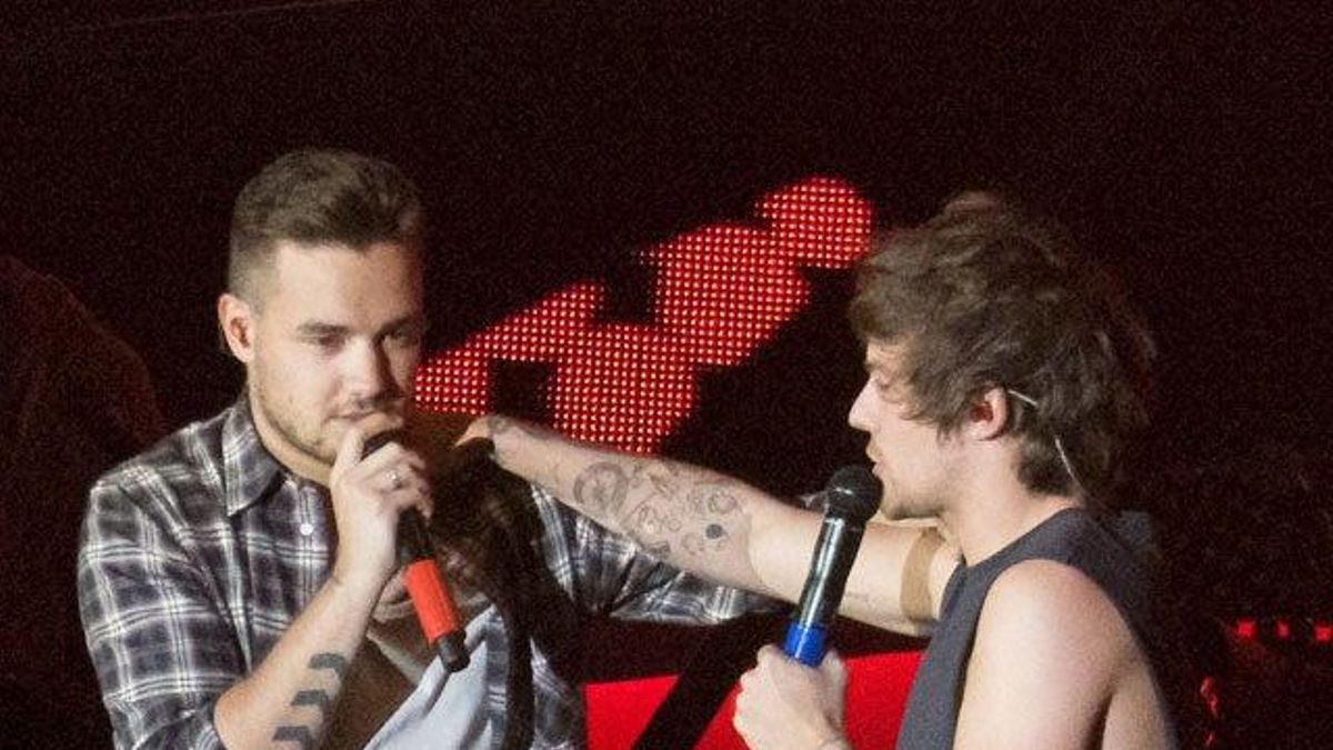 Liam Payne y Louis Tomlinson cantan juntos en el concierto de Cardiff