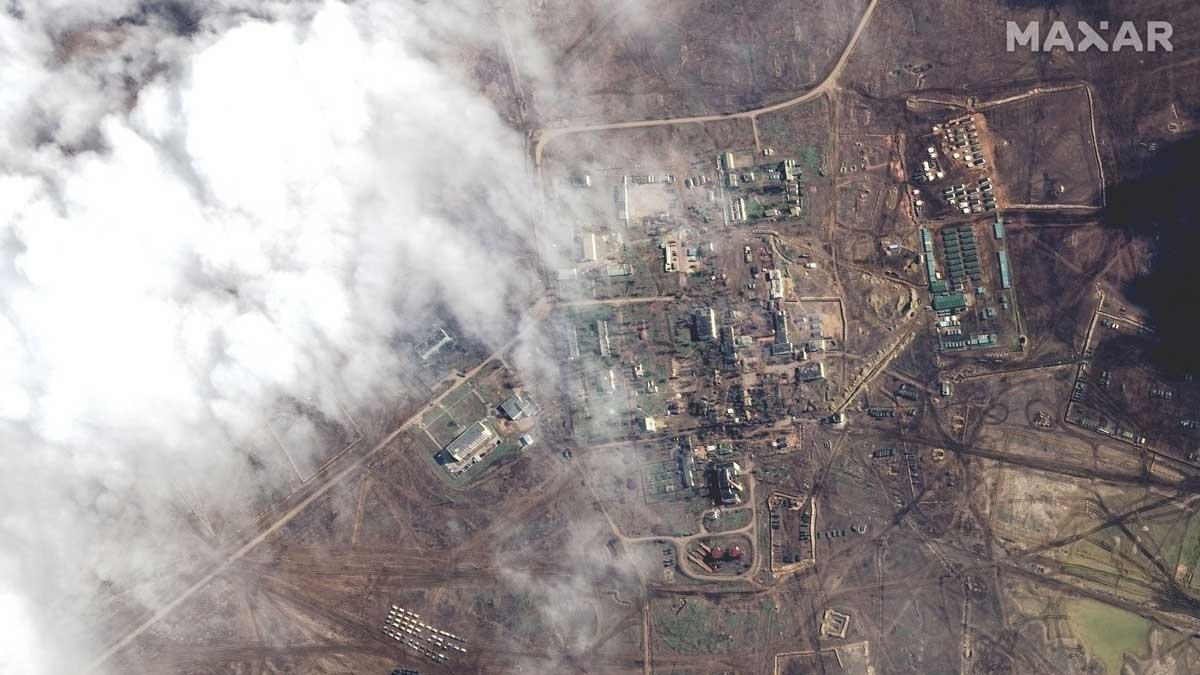 MAXAR TECHNOLOGIES A satellite image shows equipment parked, troop tents and other vehicles at the Opuk training area, in Crimea A satellite image shows equipment parked, troop tents and other vehicles at the Opuk training area, in Crimea, February 15, 2022. Picture taken February 15, 2022. Maxar Technologies/Handout via REUTERS ATTENTION EDITORS - THIS IMAGE HAS BEEN SUPPLIED BY A THIRD PARTY. NO RESALES. NO ARCHIVES. MANDATORY CREDIT. DO NOT OBSCURE LOGO REFILE-CORRECTING DATE