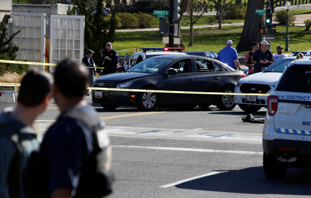 Capitol Hill police inspect a car whose driver ...