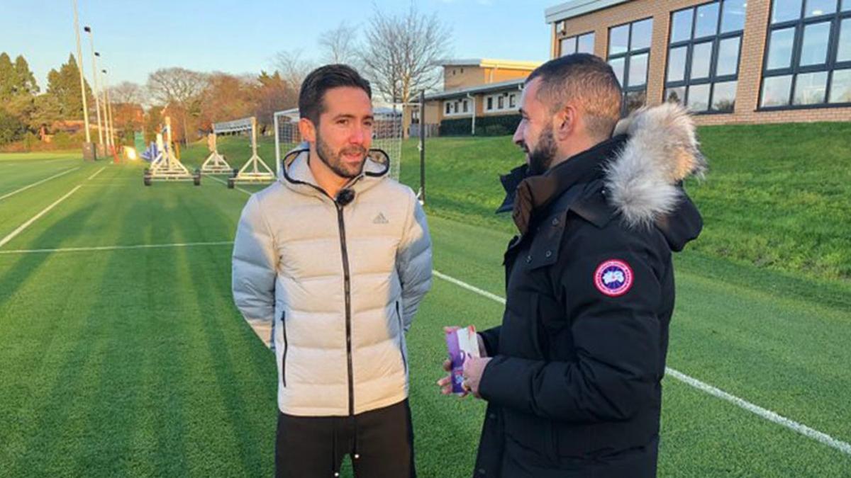 Simao junto a su compatriota Joao Moutinho