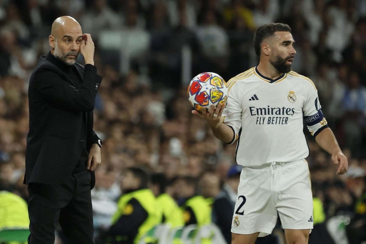 Pep Guardiola y Dani Carvajal, durante un Real Madrid-Manchester City.
