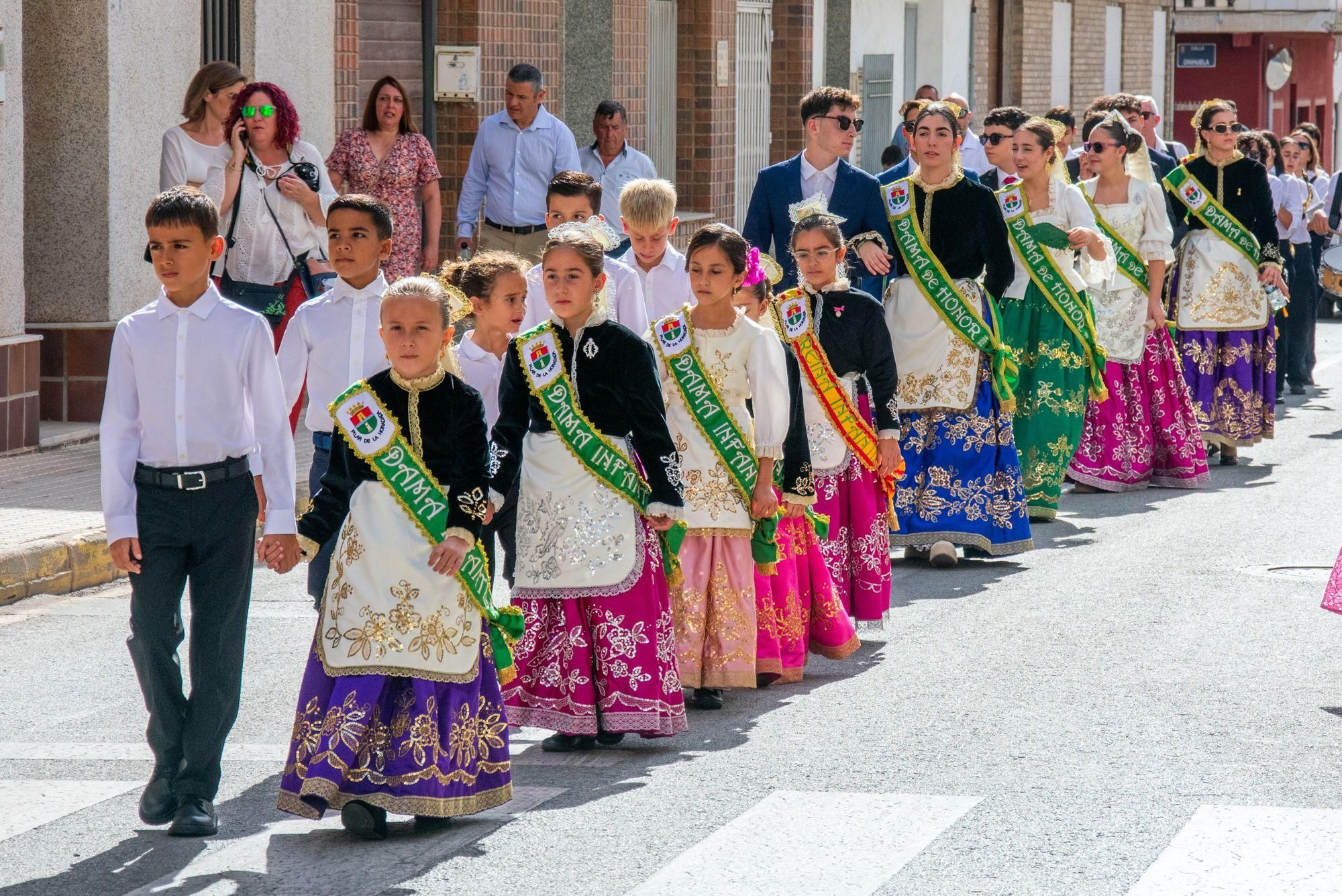 La ofrenda de flores de la Virgen del Pilar de Pilar de la Horadada, en imágenes