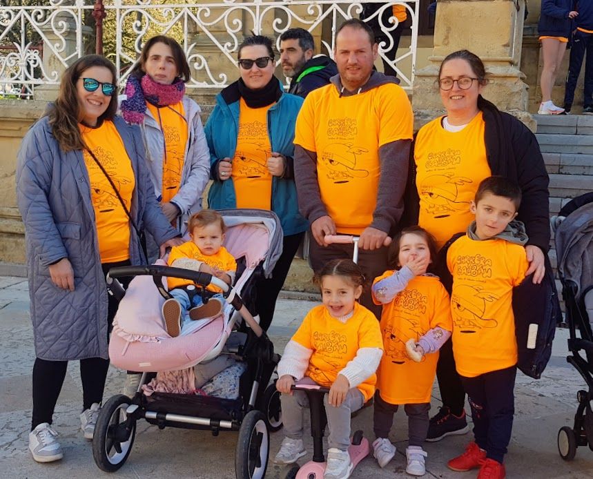 Una marea naranja de solidaridad inunda Villaviciosa: así fue la carrera de Galván