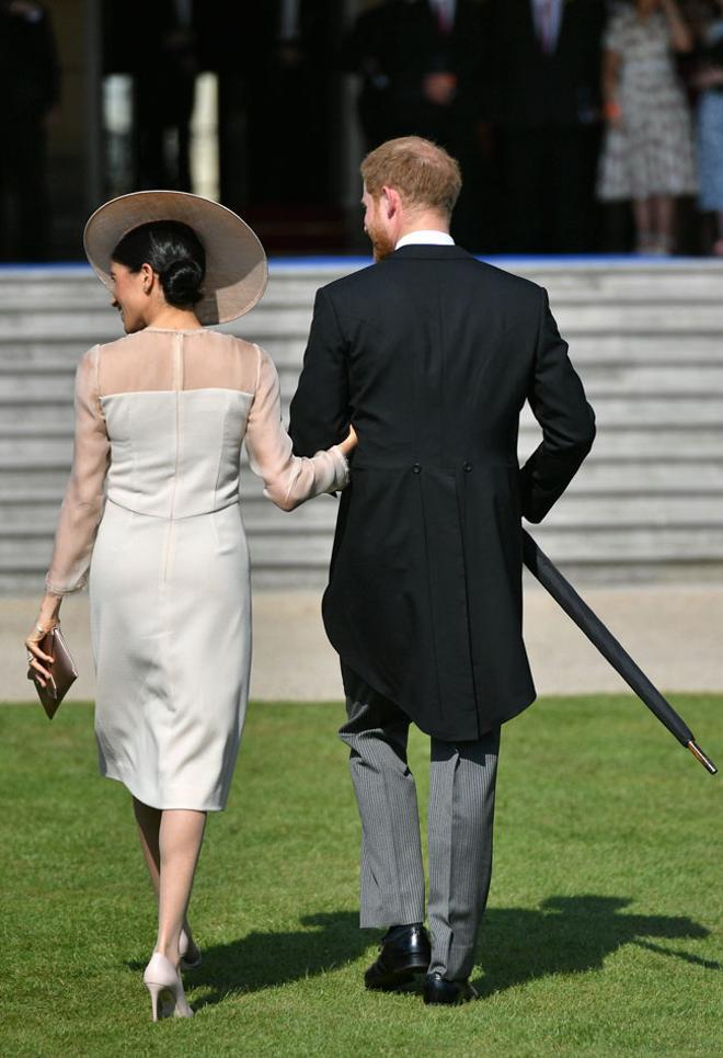 Meghan Markle y el Príncipe Harry en su primer acto como marido y mujer