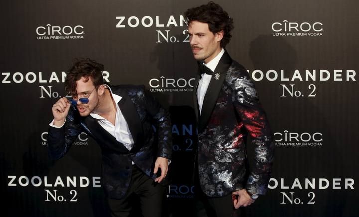 Spanish fashion designer Juan Avellaneda and producer Aldo Comas pose during a photo call before the fan screening of the film "Zoolander 2" in Madrid, Spain