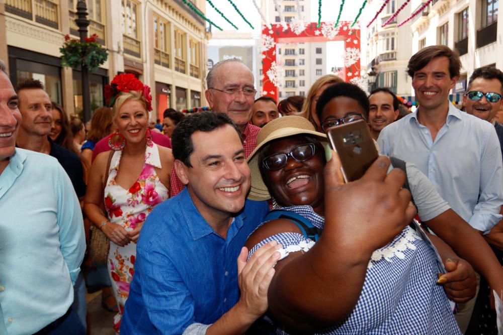 Paseo de Feria de Juanma Moreno por la calle Larios