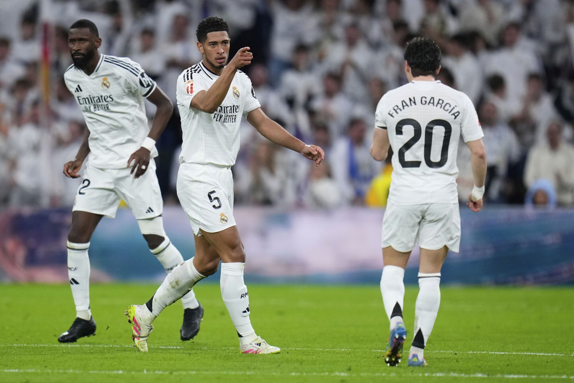 Real Madrid's Jude Bellingham reacts after scoring during a Spanish La Liga soccer match between Real Madrid and Leganes at the Santiago Bernabeu stadium in Madrid, Spain, Saturday, March 29, 2025. (AP Photo/Manu Fernandez)