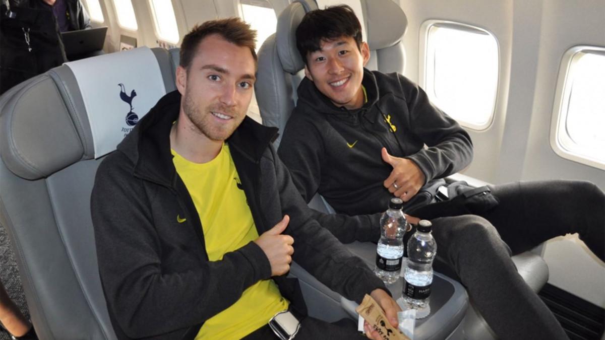 Christian Erikssen y Son Heung-Min en el vuelo del Tottenham hacia Madrid