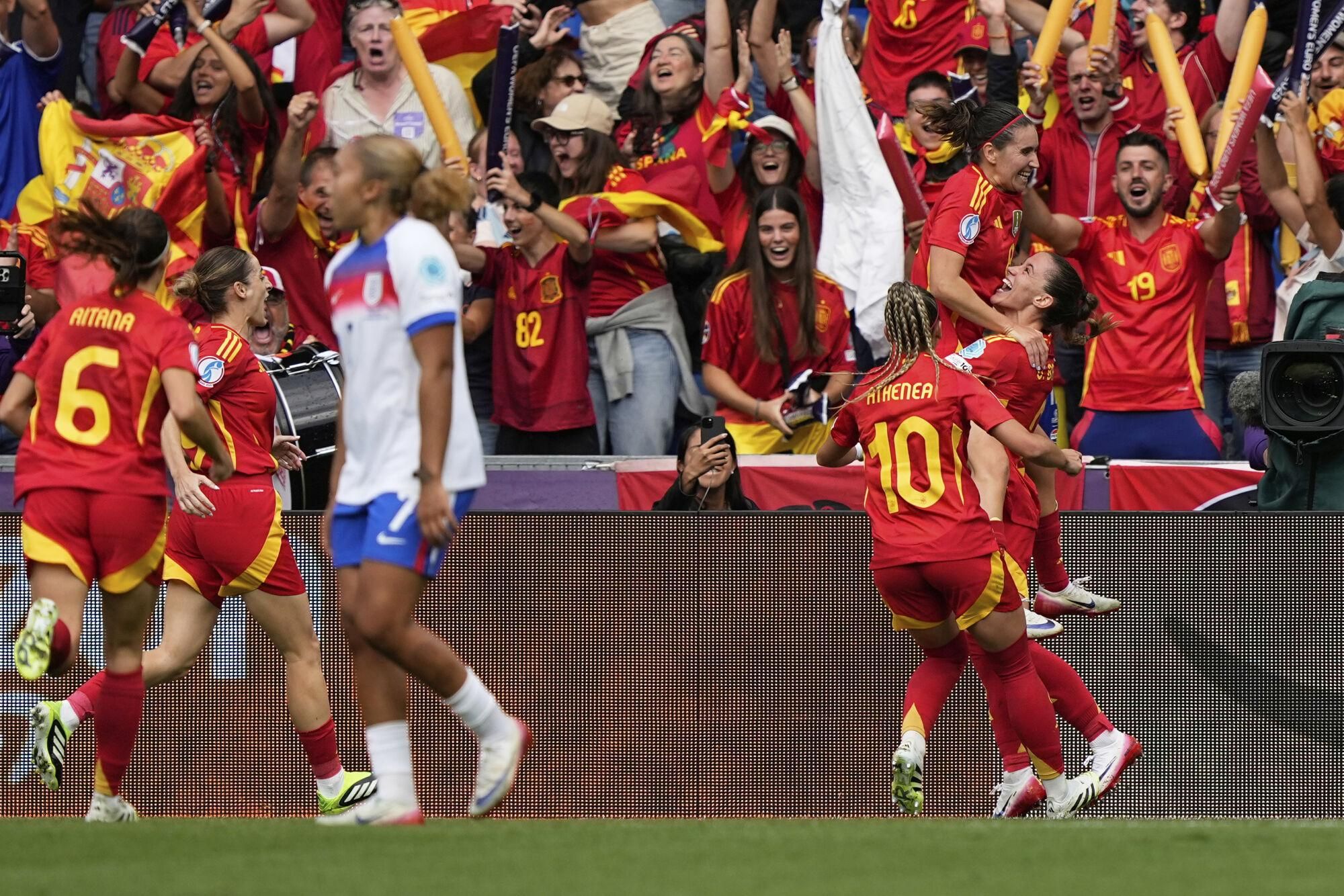 Spain's Mariona Caldentey celebrates with teammates after scoring her sides first goal during the Women's Euro 2025 final soccer match between England and Spain at St. Jakob-Park in Basel, Switzerland, Sunday, July 27, 2025. (AP Photo/Martin Meissner)