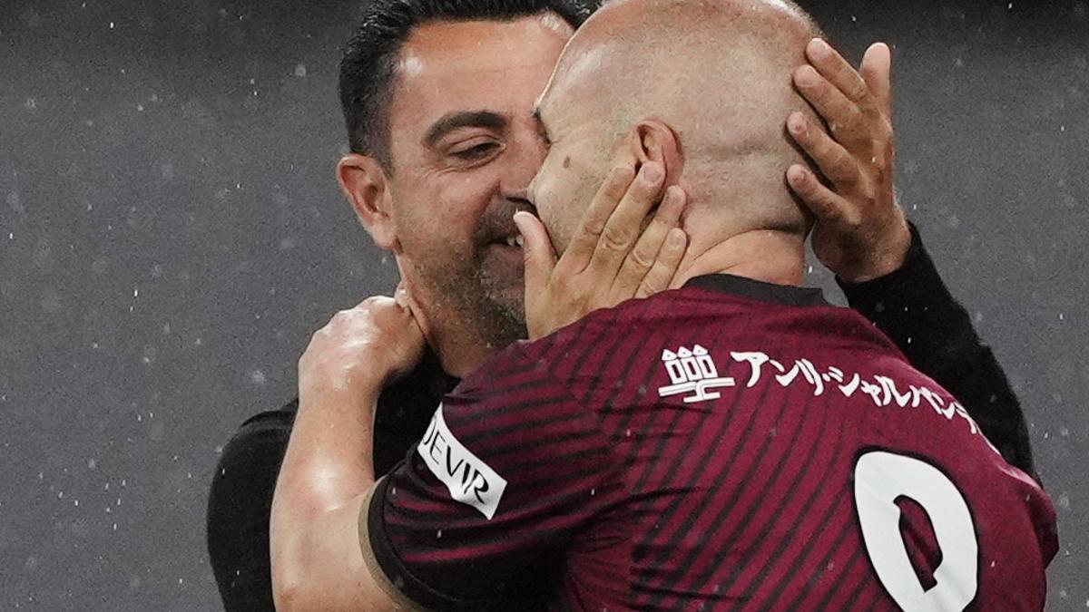 Andrés Iniesta y Xavi Hernández