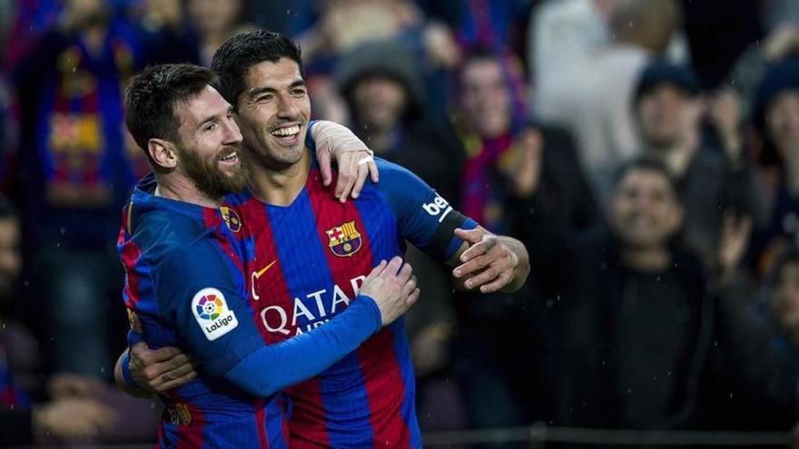 Messi y Suárez, los felices 50